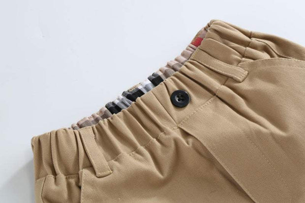 Boys Casual Cotton Trousers with elastic waistband and button detail.