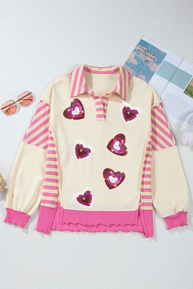 Pink sequin heart collared top with playful design and vibrant colors.