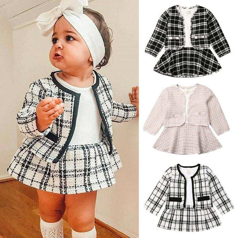 Two Piece Children Wind Suit with plaid pattern in black and white, featuring a zip-up jacket and matching pants.