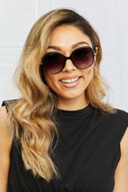 Metal Plastic Hybrid Full Rim Sunglasses being worn, featuring a stylish and durable square design with UV protection.