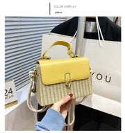 Western Shoulder Handbag in yellow with decorative stitching and unique hardware.