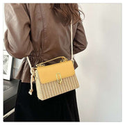 Western Shoulder Handbag with rustic charm and elegant design, featuring decorative stitching and unique hardware, worn over the shoulder.