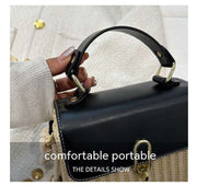 Western Shoulder Handbag with black leather handle and gold clasp.