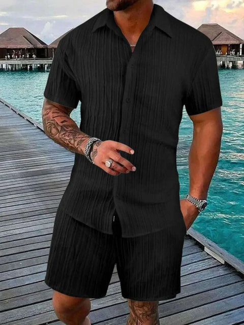 Plus Size Button Down Shorts Set in black, featuring a short-sleeve button-down shirt and matching shorts, ideal for comfortable casual wear.