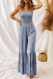 Dusk Blue Floral Jumpsuit with smocked bodice and wide-leg design.