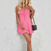 Sleeveless solid color A-line dress, pink, versatile wardrobe essential.