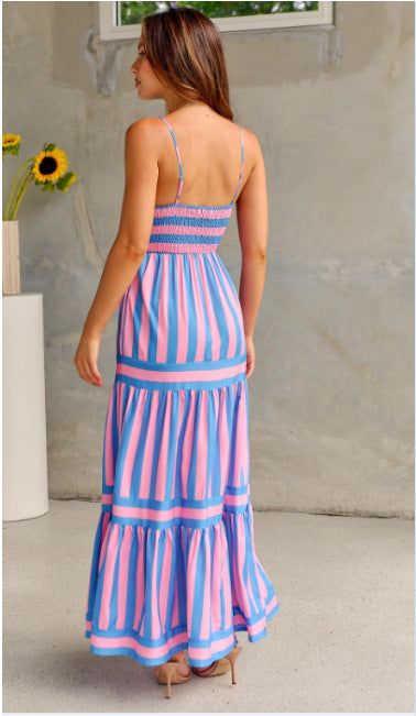 Pink and blue striped smocked dress, sleeveless, maxi length, delicate straps.