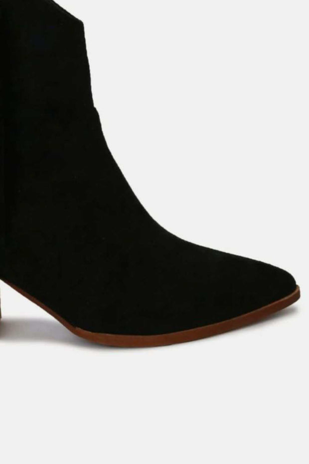 Beast Suede Fringe Ankle Boots in black suede with mid heel, featuring stylish fringe detail for trendy look.