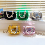 Laser Pearl Girl Tote in multiple colors with pearl and heart embellishments displayed in sunlight.