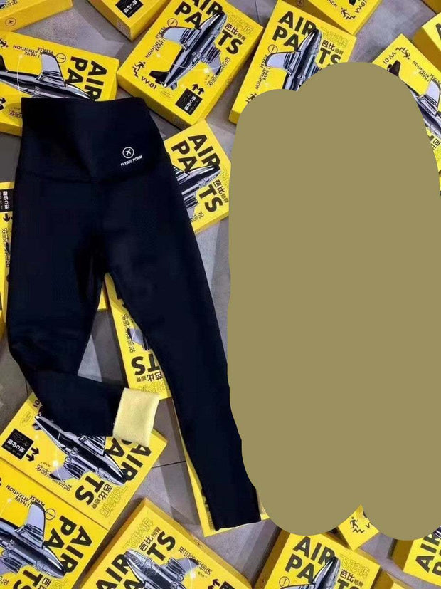 Lambs Wool Leggings on yellow boxes, black color with high waistband, showcasing softness and style.