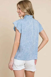 Flutter sleeve button down shirt with mineral wash fabric.