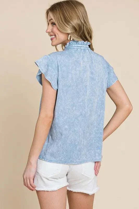 Flutter sleeve button down shirt with mineral wash fabric.