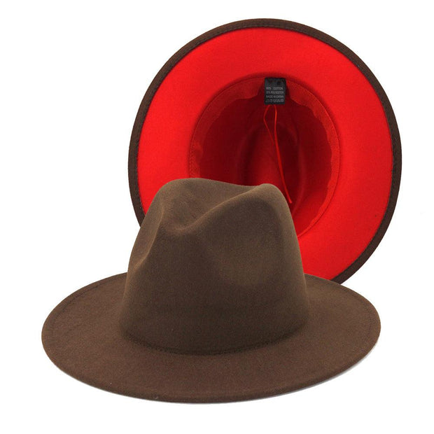 Two-tone flat brim fedora with brown exterior and red interior, bell crown style, cotton blend, provides sun protection.