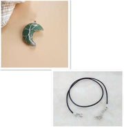 Moon Tree of Life Necklace with celestial moon pendant and black leather rope.