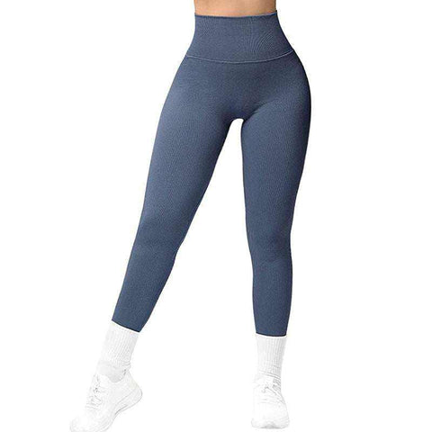 Breathable Yoga Suit in blue, showcasing high-waisted leggings fit, ideal for flexibility and comfort during yoga sessions.