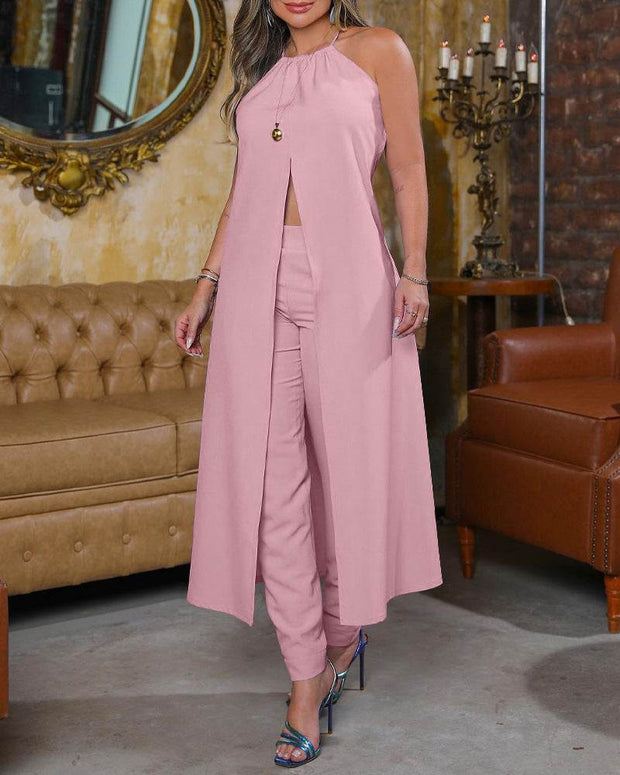 Sleeveless Backless Halter Suit in pink with halter neckline and trousers.