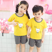 Youth Cotton Short-Sleeve Suit with cartoon print, featuring yellow shirts and grey shorts for comfortable summer wear.
