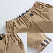 Boys casual cotton trousers with elastic waistband and modern fit details.