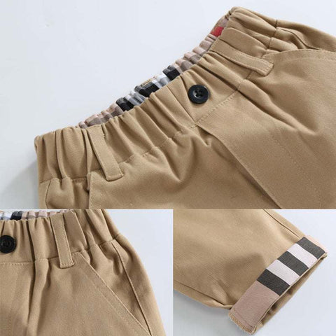 Boys casual cotton trousers with elastic waistband and modern fit details.