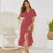 Elegant woman wearing red V-Neck Lace-Up Chiffon Skirt with high-rise waist and irregular hem.