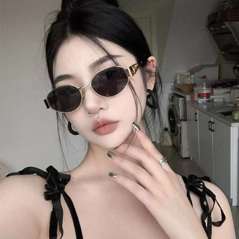 Metal Oval Vintage Sunglasses with metal frame, classic oval shape, and UV protection.