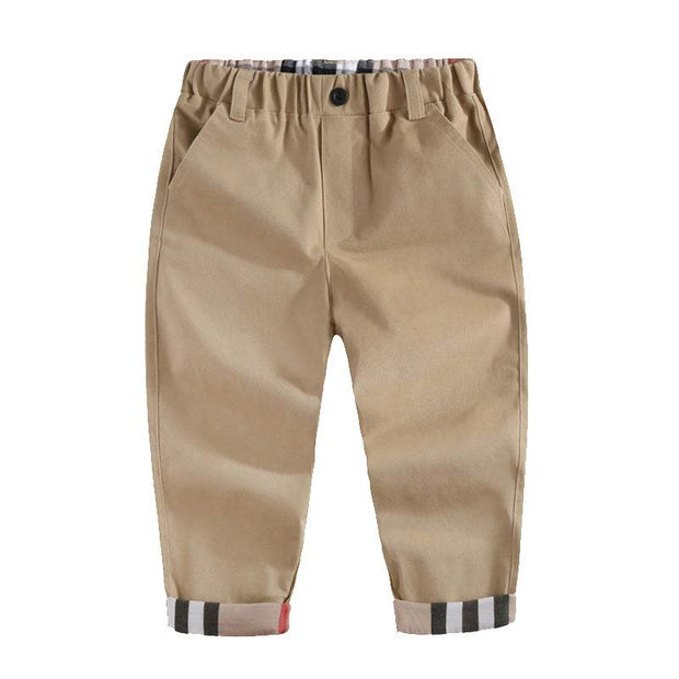 Boys casual cotton trousers with elastic waistband and pockets, khaki color, modern fit.