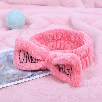 Coral Velvet Butterfly Hair Band with text design on soft velvet material, perfect for stylish hair accessory.