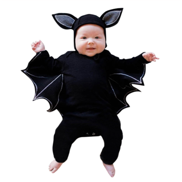 Baby wearing Batman Baby Onesie with bat wings and ear hood.