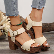 Peep Toe Block Heel Sandals with chic design, adjustable ankle strap, and cushioned footbed for style and comfort.