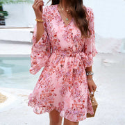 Floral Print Short Sleeve Dress with vibrant floral design, cinched waist, and flowy skirt, ideal for spring and summer occasions.