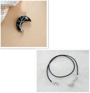 Moon Tree Of Life Necklace with celestial moon pendant on black leather rope.