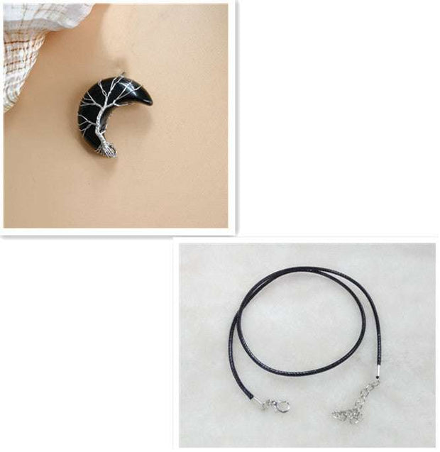 Moon Tree Of Life Necklace with celestial moon pendant on black leather rope.