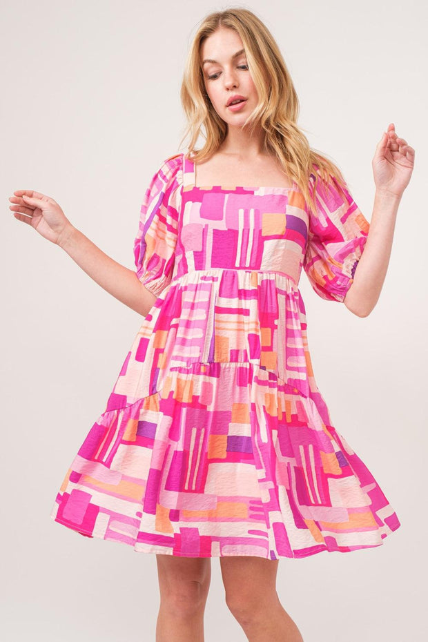 Color Block Puff Sleeve Dress with bold pattern and playful design.