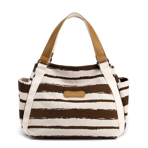 Stylish One-Shoulder Tote with canvas lining and spacious interior, featuring multiple compartments and elegant design.