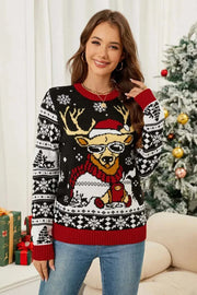 Woman wearing a festive Christmas pattern long sleeve sweater with reindeer design and red accents
