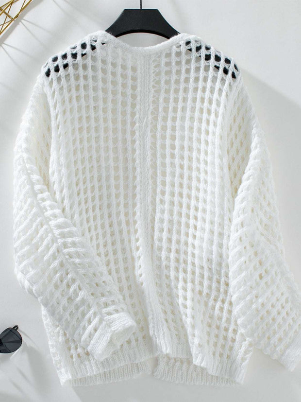 Open Front Openwork Cardigan with intricate pattern on hanger, lightweight knit fabric.
