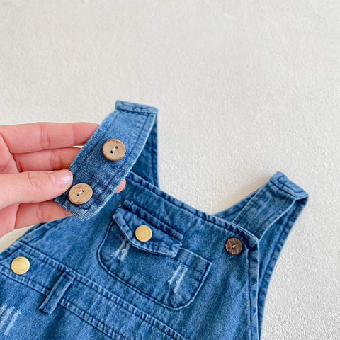 Denim strap detail of Two-Piece Baby Suit with buttons.