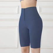 Navy blue Abdominal Hip Lift Yoga Pants with high-waisted design for support and flexibility.