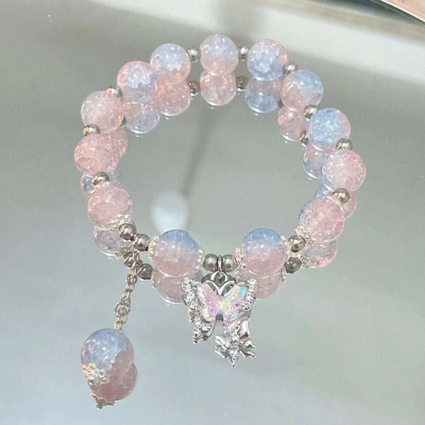 Whimsical Fairy Beads Butterfly Bracelet with pink and blue beads and butterfly charm.