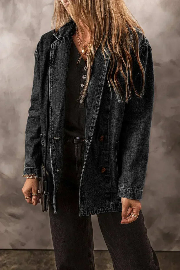 Pocketed Denim Jacket with button-up front and functional pockets, worn over a black outfit.