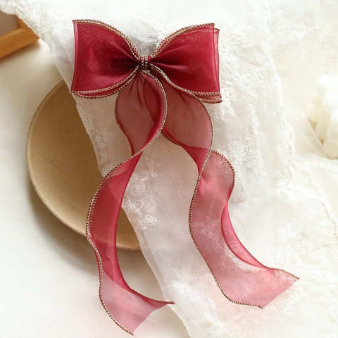 Children's bow hairpin in vibrant red with playful bow design, perfect for girls' hairstyles, made from high-quality lace for durability and comfort.