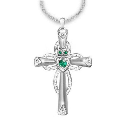 Emerald Cross Necklace with vibrant emerald accents and classic design.