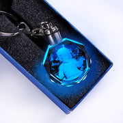 Crystal keychain with custom photo and blue LED light in gift box.