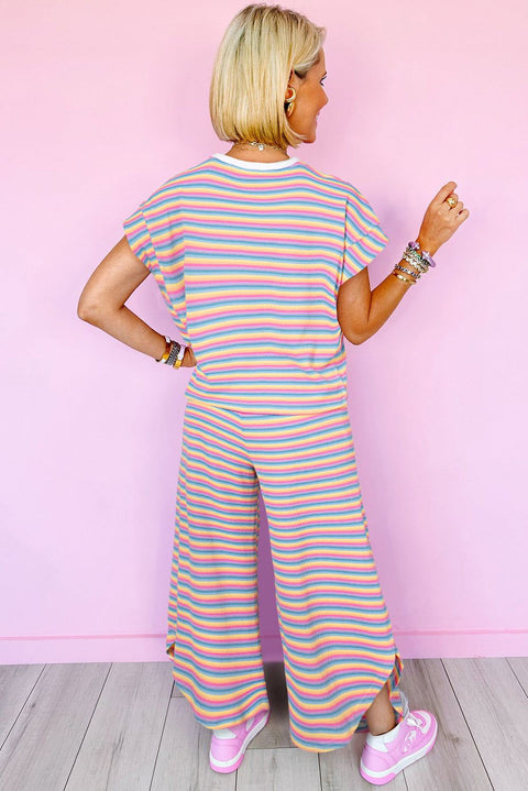 Rainbow stripe tee and wide leg pants set; vibrant casual outfit with colorful stripes, perfect for relaxed fashion.