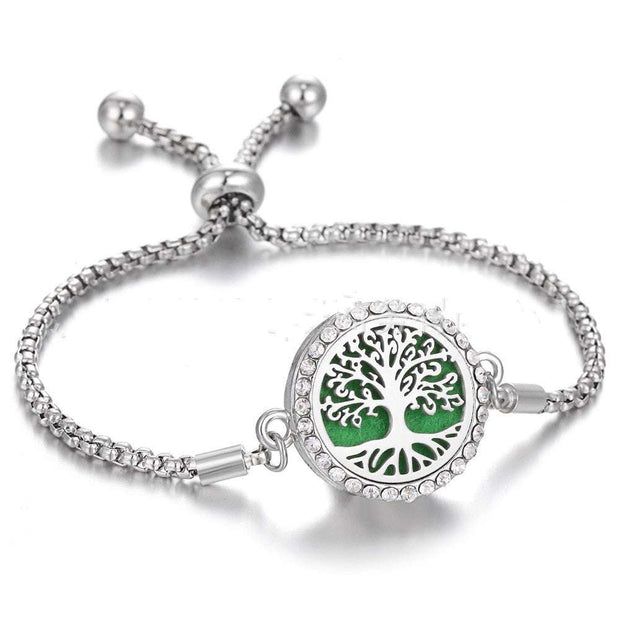 Hollow Stainless Steel Aromatherapy Bracelet with intricate design and adjustable band.