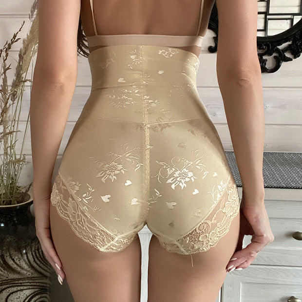 Lace high waist belly zipper pants in skin tone, showcasing elegant lace detailing and a flattering fit.