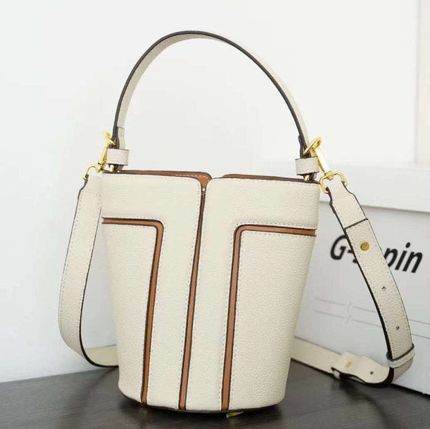 Large Capacity Shoulder Bag with beige genuine leather and adjustable strap.