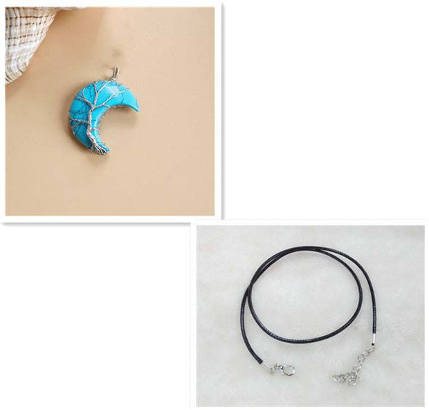 Moon Tree Of Life Necklace with blue moon pendant and black leather rope.
