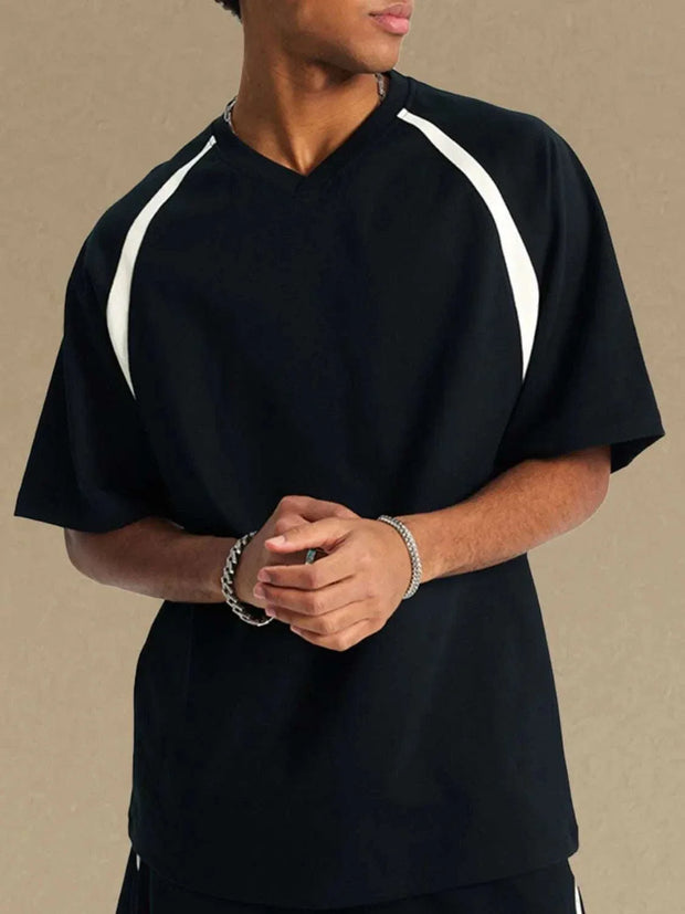 Contrast Round Neck Half Sleeve T-Shirt with visual interest from contrasting colors on collar and sleeves.