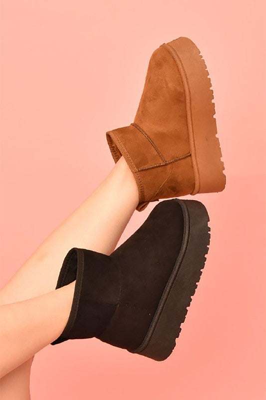 WILD DIVA Suede Platform Booties in brown and black, featuring chic platform sole and sleek silhouette for stylish comfort.